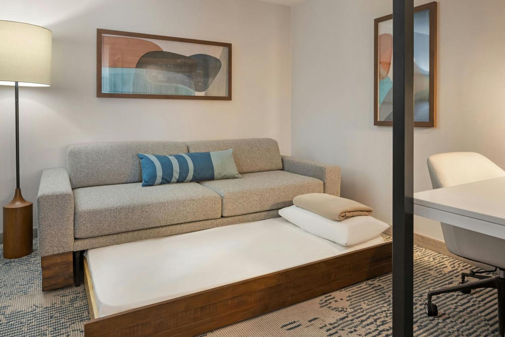 King Suite with Trundle Sofa - Hearing Accessible